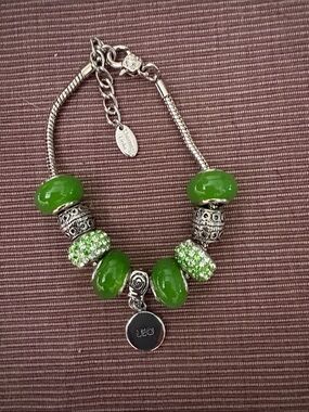 Green Glass Bead Charm Bracelet with Leo Pendant by Charmed Links